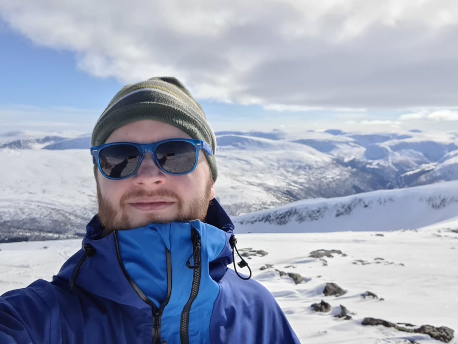 Bjarne on a snow-covered mountain summit
